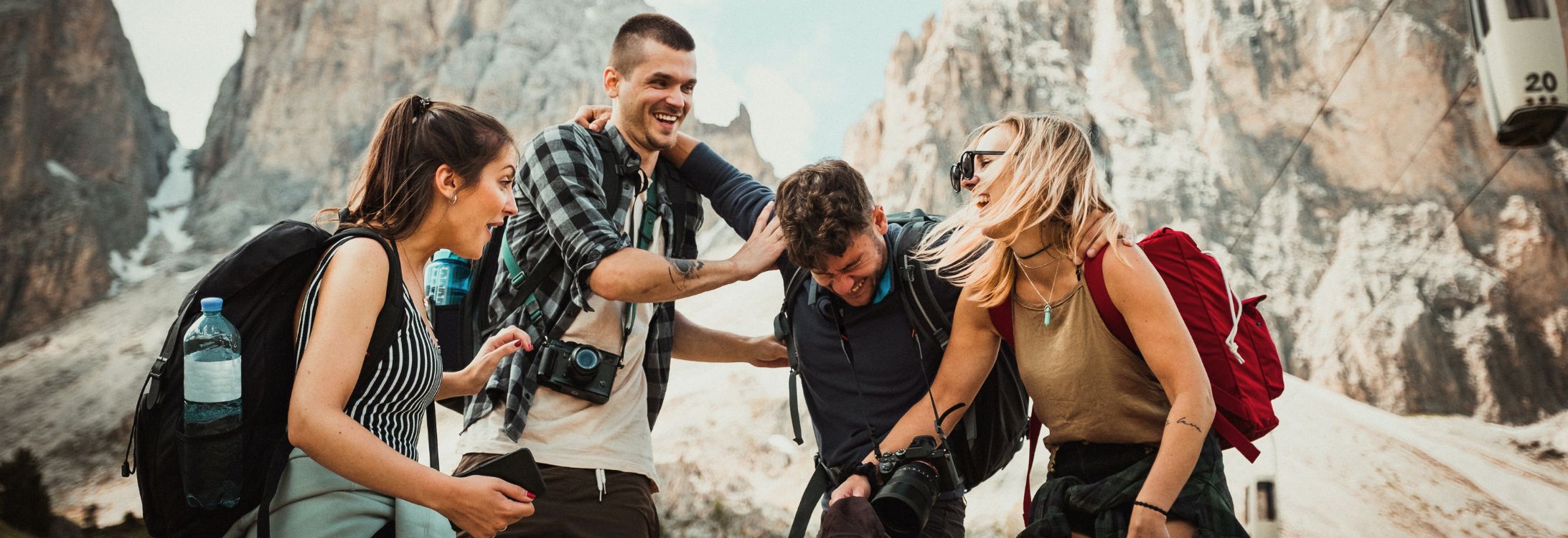 Friends laughing on a mountain