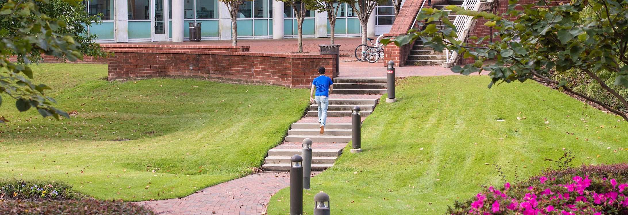 Student walking up the stairs