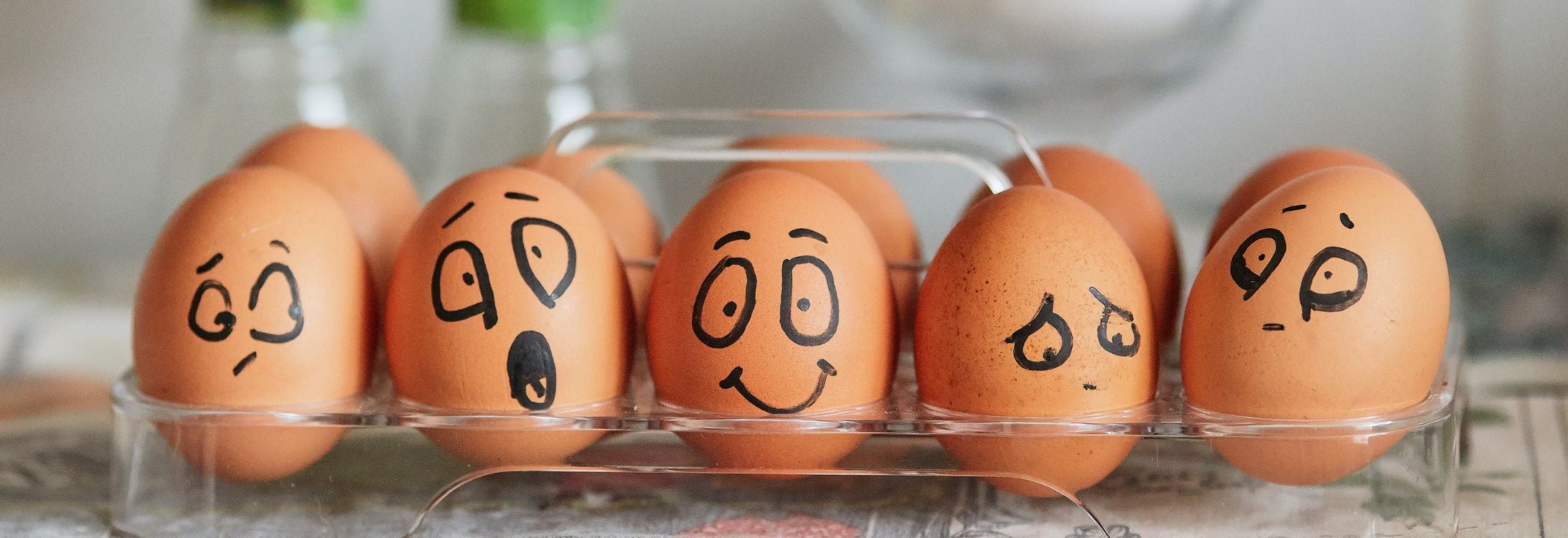 Eggs with faces drawn on - Impostor Syndrome blog cover